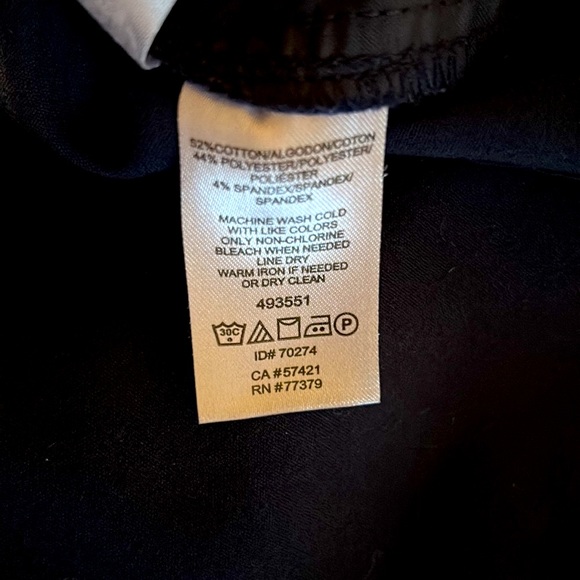 Ann Taylor navy blue dress pants with decorative front buttons. Like new. - Picture 6 of 8